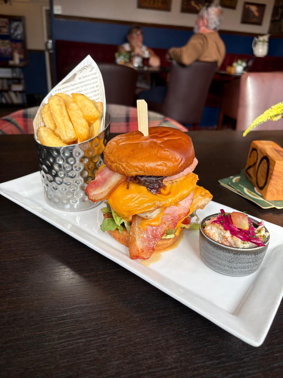 Burger and fries with a side salad