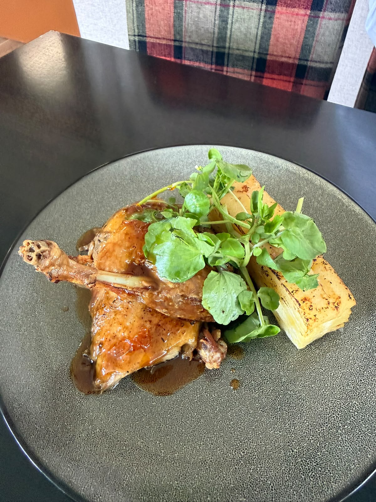 Battered fish with dressed leaves