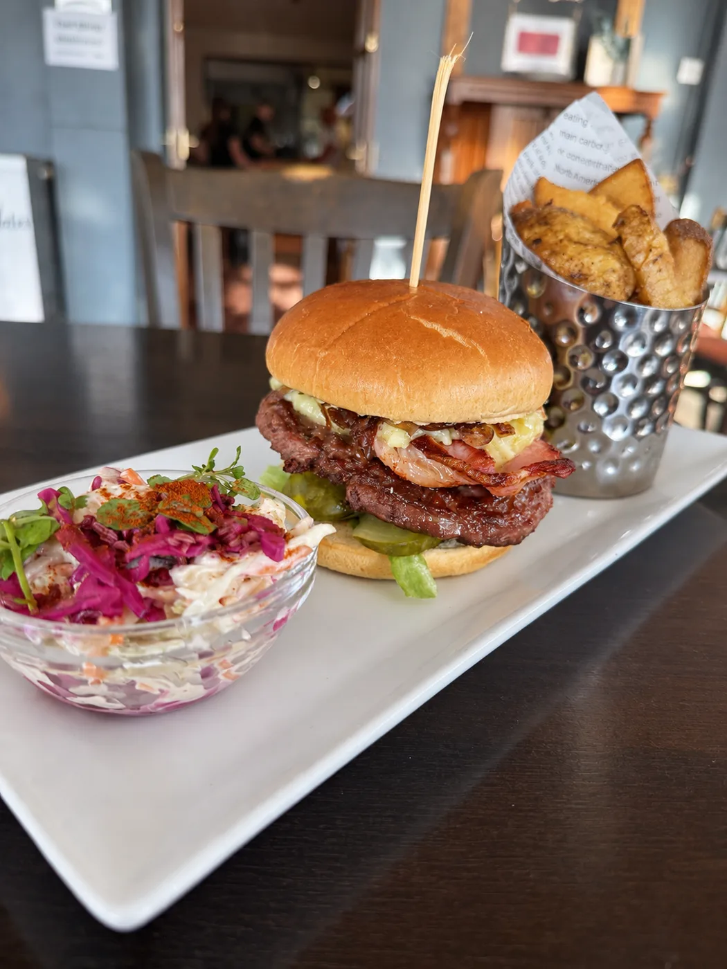 The Malcolm Arms burger with bacon, chunky chips and red slaw