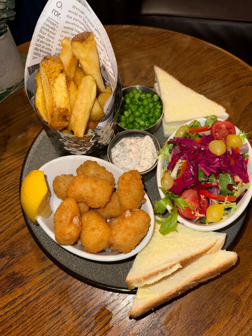 Scampi with chunky chips, peas, tartare sauce, salad and bread